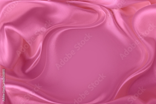 Pink satin background. Silk fabric with pleats. Satin, silk or satin create a beautiful drapery. Fashionable design.