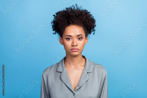 Photo of young afro woman wear silky pajama serious sleep bad moody isolated over blue color background