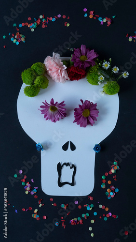 16x9 Vertical photo serie with different designs about Day of the Dead Skull Calavera Catrina made of paper and flowers. Design version number 12 of 15 (see others) photo