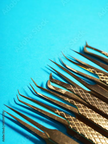 Tweezers of different shapes for eyelash extensions  artificial eyelash masters. tweezers for working with eyelashes and eyebrows