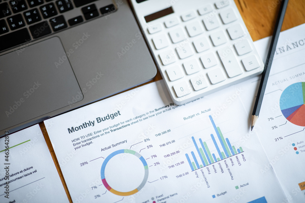 The Financial accounting calculate concept with calculator graphs and charts The Financial accounting calculate concept with calculator graphs and charts