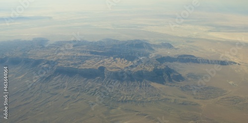 Desert mountain ridge dominating its plateau