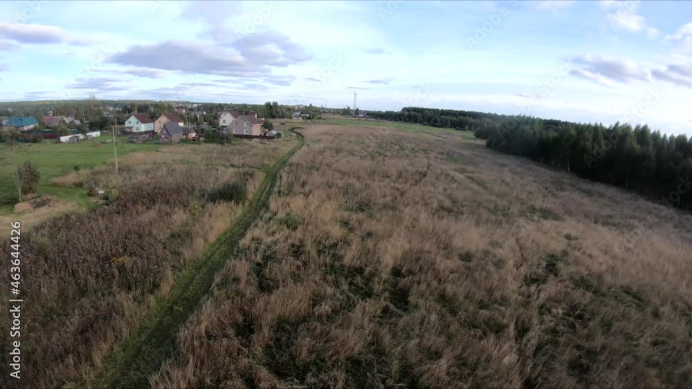 flying on an fpv drone behind a horse, a girl on a horse, in a green field, against the background of a forest, bushes, trees, blue sky, white clouds flying on an fpv drone behind a horse, a girl on a horse, in a green field, against the background of a forest, bushes, trees, blue sky, white clouds