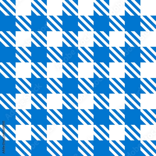 Blue tartan and plaid. Vector pattern resembling a tablecloth or shirt.