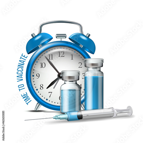Time to vaccinate concept. Syringe, bottles of vaccine and alarm clock.