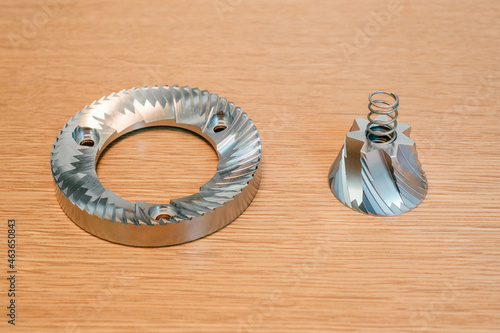 Bilde på lerret Coffee Burr Grinder flat and conical stainless steel burr on wooden background