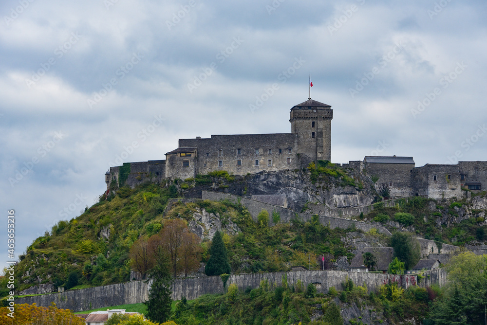 Lourdes, France - 9 Oct 2021: The Chateau Fort de Lourdes overlooking the town and Rosary Basilica
