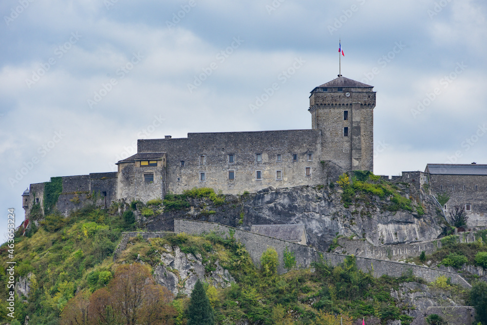 Lourdes, France - 9 Oct 2021: The Chateau Fort de Lourdes overlooking the town and Rosary Basilica