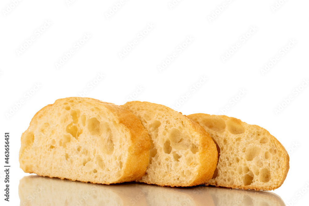Three slices of aromatic ciabatta, close-up, isolated on white.