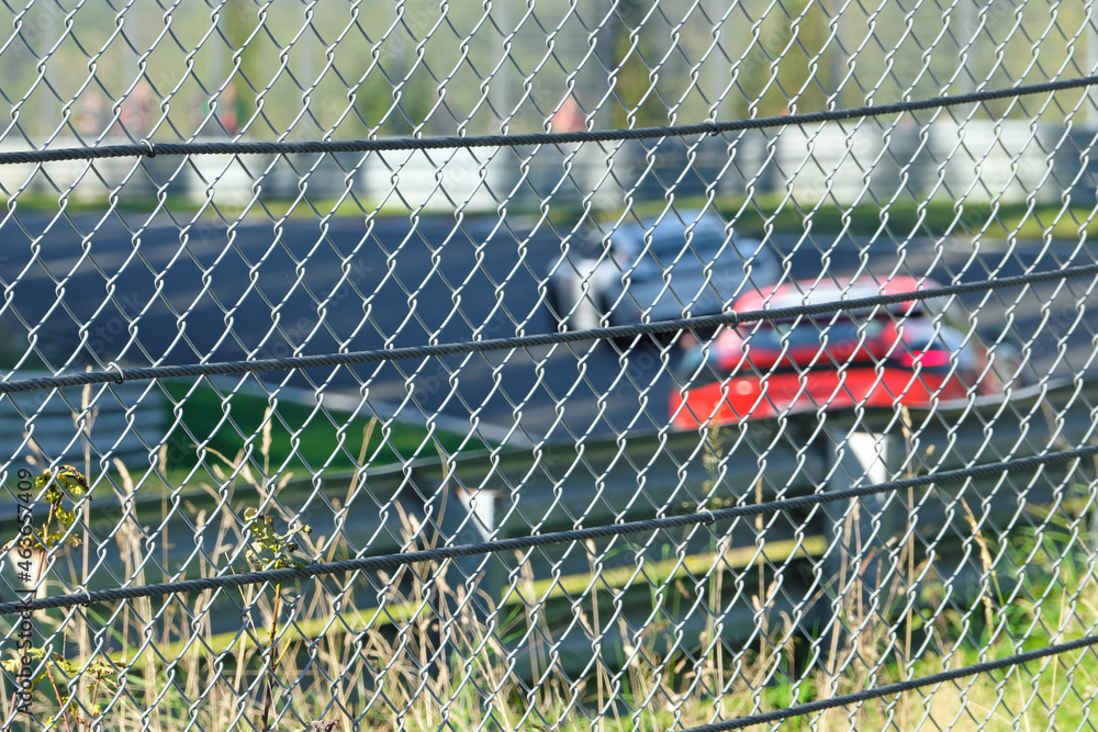 Security fence on racing circuit - Stockphoto