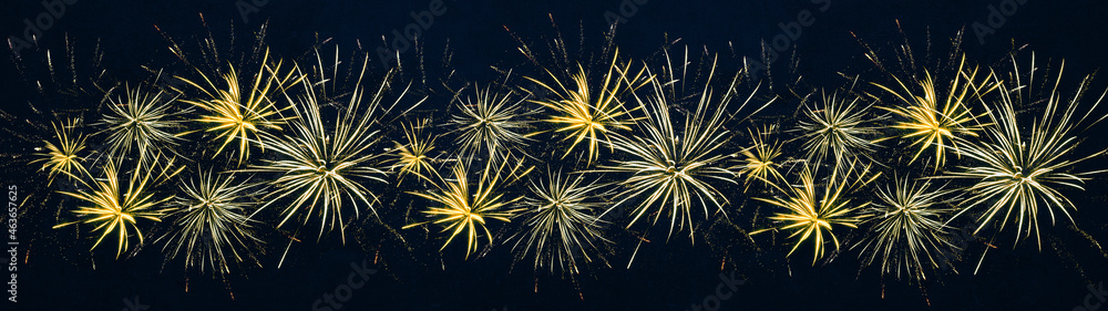 Obraz premium HAPPY NEW YEAR - Festive silvester background panorama greeting card banner long - Golden firework and bokeh light in the dark blue night