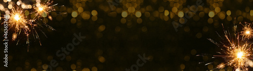HAPPY NEW YEAR - Festive silvester background panorama greeting card  banner long - Golden firework and bokeh light in the dark black  night