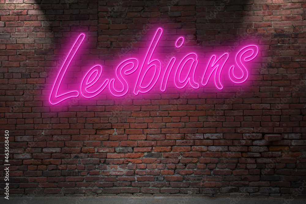 Neon lettering lesbians Pride on Brick Wall at night Neon lettering lesbians Pride on Brick Wall at night