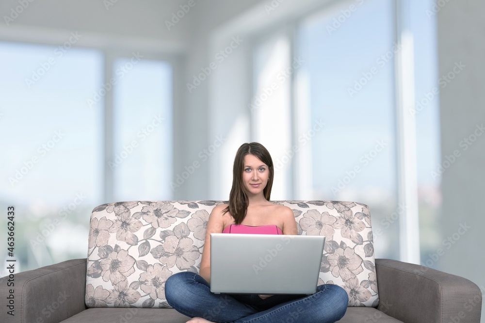 Happy young beautiful woman relaxing at home. Happy young beautiful woman relaxing at home.