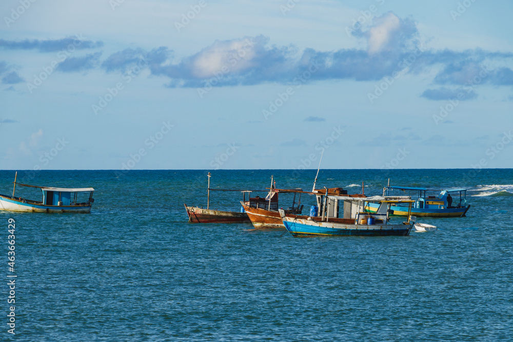 Boats and speedboats on the coast of Praia do Forte - Bahia