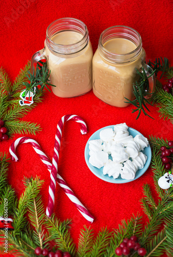 Christmas tree, candy, coffee marshmellou on a red background. Happy New Year photo