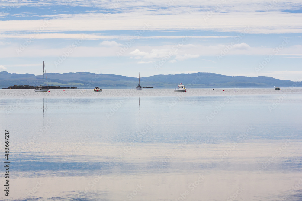 Yachts and lighthouse in beautiful Scottish Loch Fyne on a lovely summers day. 