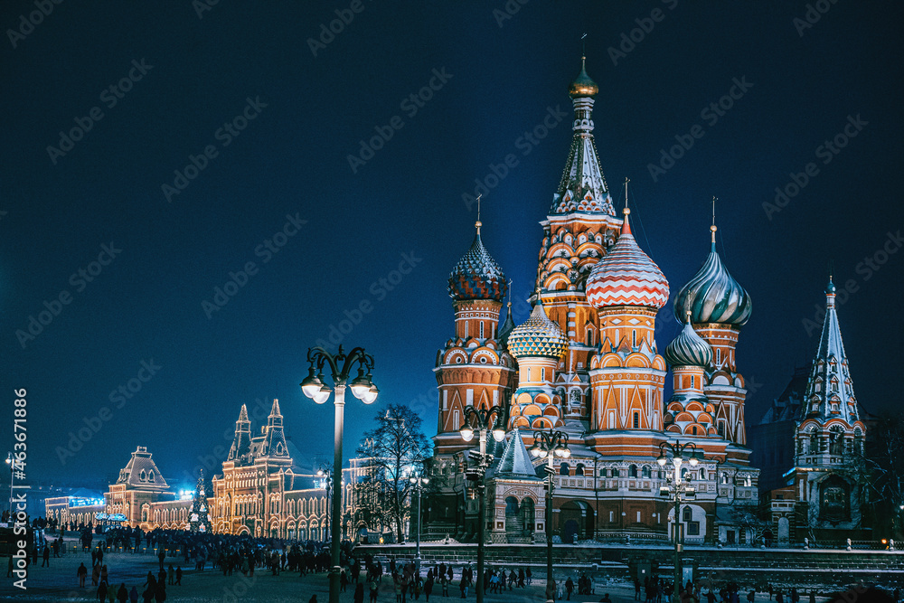 Christmas Moscow. New year in the capital of Russia. Christmas evening in the center of Moscow. St. Basil Cathedral on the background of a winter landscape. New year celebration in Russia.