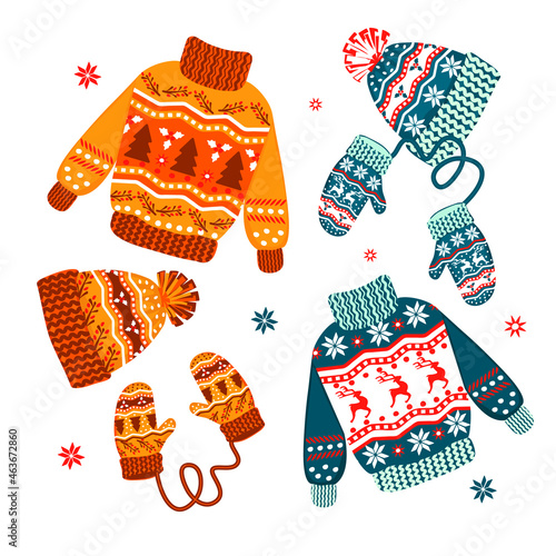 Christmas warm clothes set.Flat cartoon different knitwear.Holiday cute sweaters, hats and mittens with scandinavian patterns.Isolated vector illustration.Prefect for greeting cards,icons,posters.