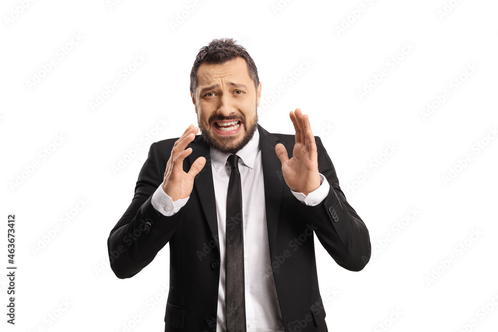 Scared businessman making a grimace Scared businessman making a grimace