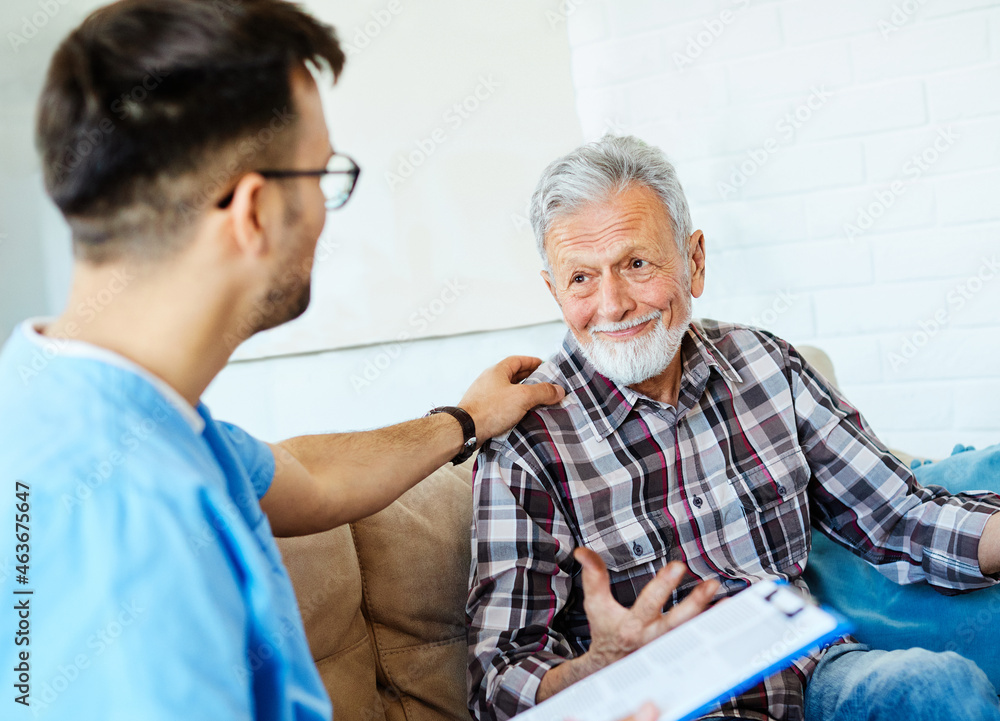 nurse doctor senior care caregiver help assistence retirement home nursing elderly man insurance sofa document writing support