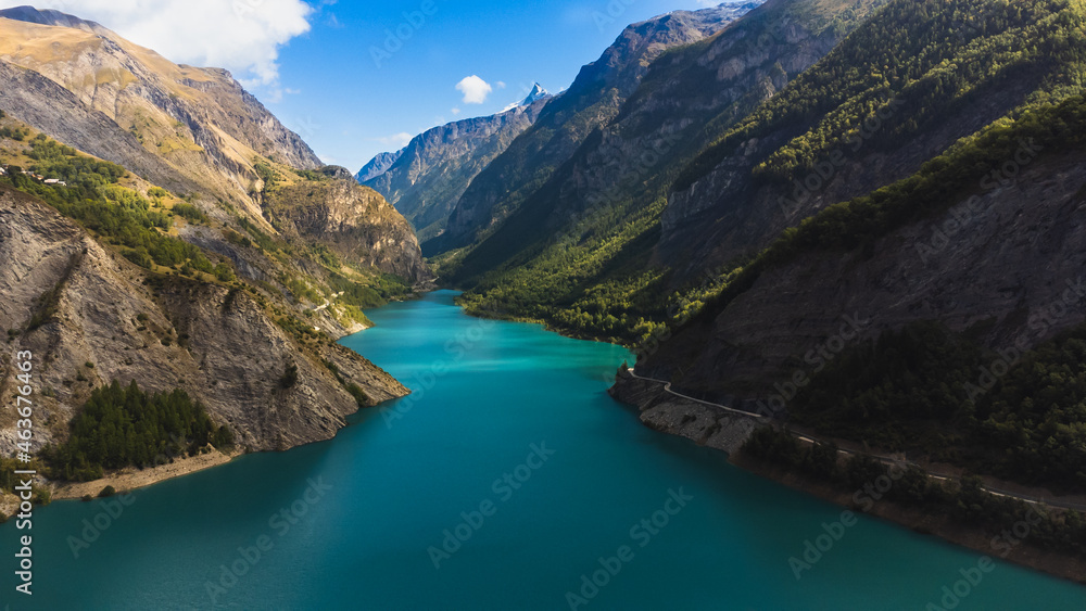 Chambon lake France beautiful river water between french alps mountains during summer