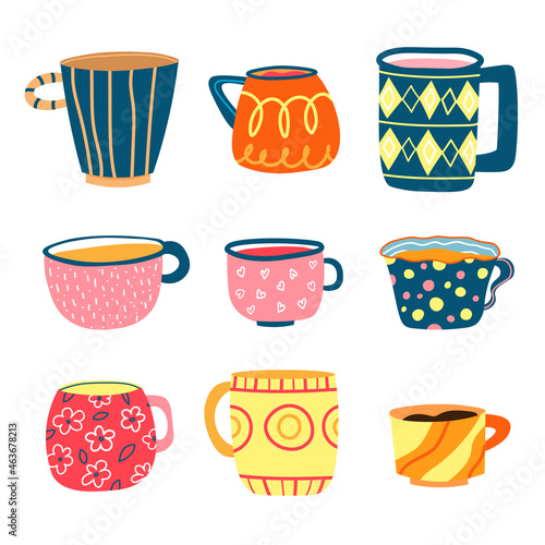 Set of cute handmade ceramic mugs. Set of ceramic kitchenware