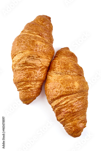 Freshly baked croissants, isolated on white background.