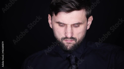 the man put on a gray skeleton mask and adjusted it on his face