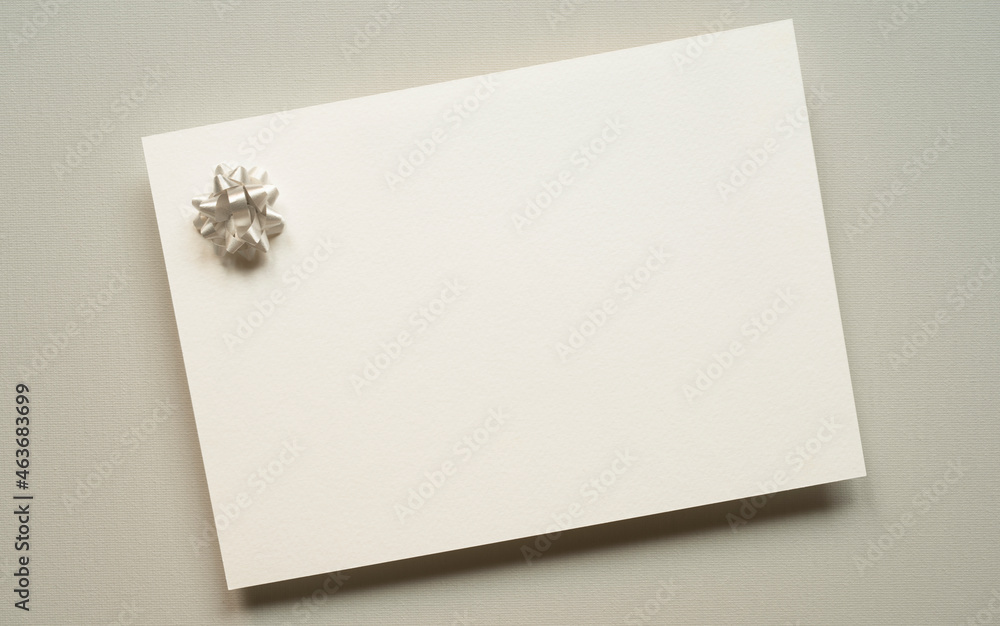 blank white invitation template, rectangle, decorative bow, light background, canvas texture, photo taken from above blank white invitation template, rectangle, decorative bow, light background, canvas texture, photo taken from above