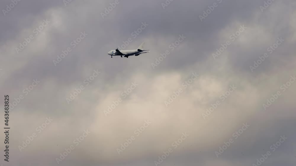 Airfreighter flying in the clouds Airfreighter flying in the clouds