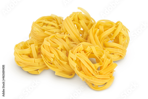 Raw tagliatelle pasta isolated on white background with clipping path and full depth of field