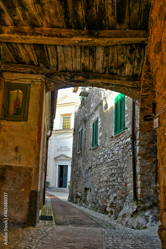 A narrow street of Castro dei Volsci in medieval town of Lazio region, Italy. photo