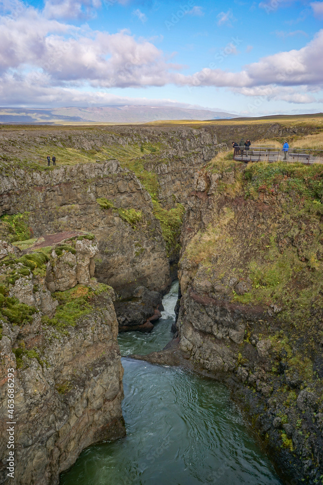 Bakkavegur, Iceland: Visitors at Kolugljufur Canyon, near the Kolufossar Waterfalls, on the Vididalsa River.