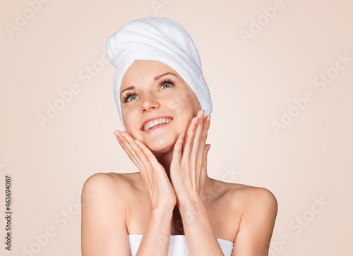 Spa and skin care. Young female with healthy, glowing face and body,