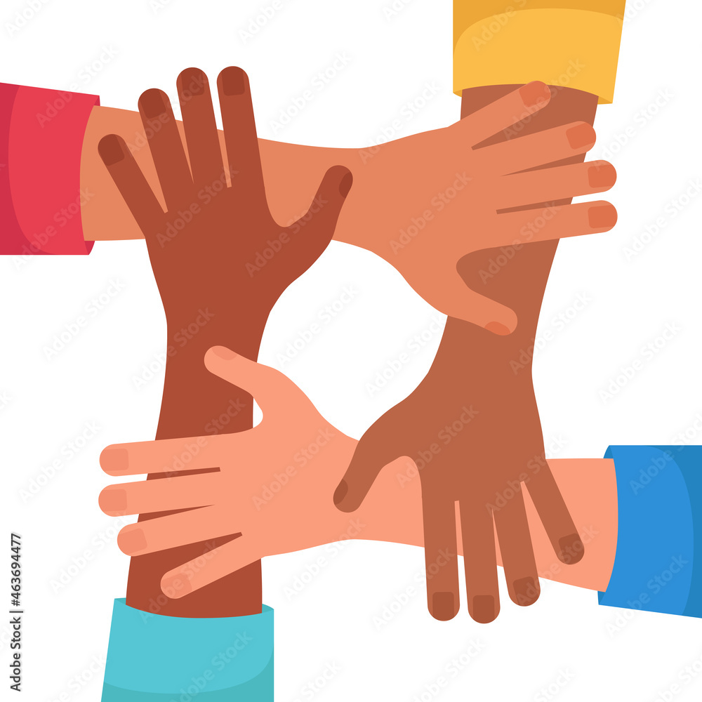 Close up top view of young business people holding their hands together. Stack of hands. Teamwork concept.