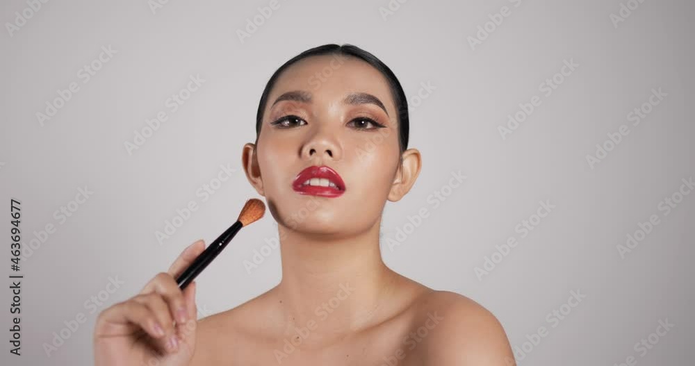Close up of Beauty Asian woman makes makeup Close up of Beauty Asian woman makes makeup