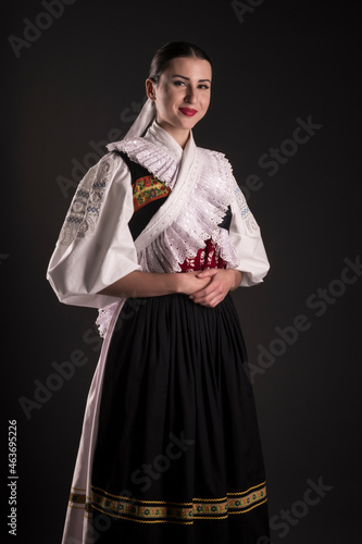 Young beautiful slovak woman in traditional dress. Slovak folklore