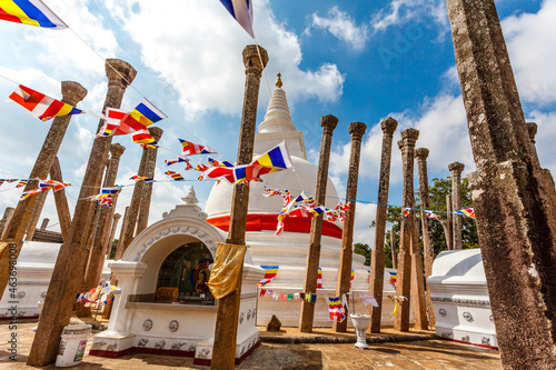 Картината върху платно The white Thuparama dagoba with a red ribbon, Anuradhapura, Sri Lanka, Asia