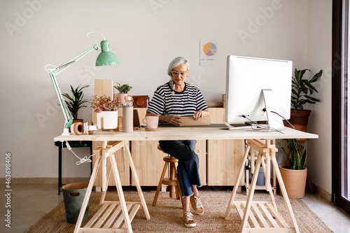 Woman preparing an order at workplace