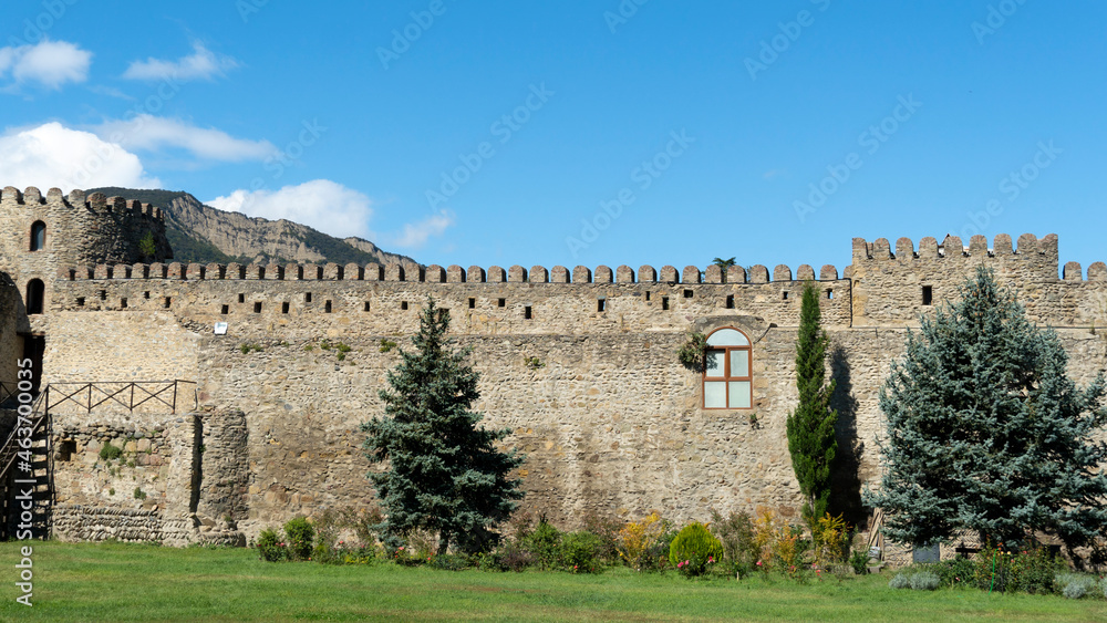 old stone wall. stone fortress. old defensive wall and watchtower