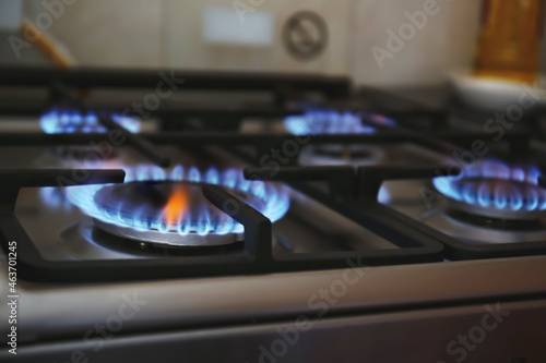 Gas burner with blue flame on domestic stove