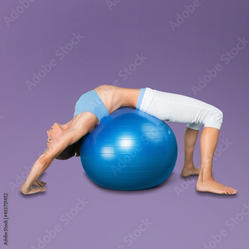 young happy fit woman train sit on the fit ball do winner gesture