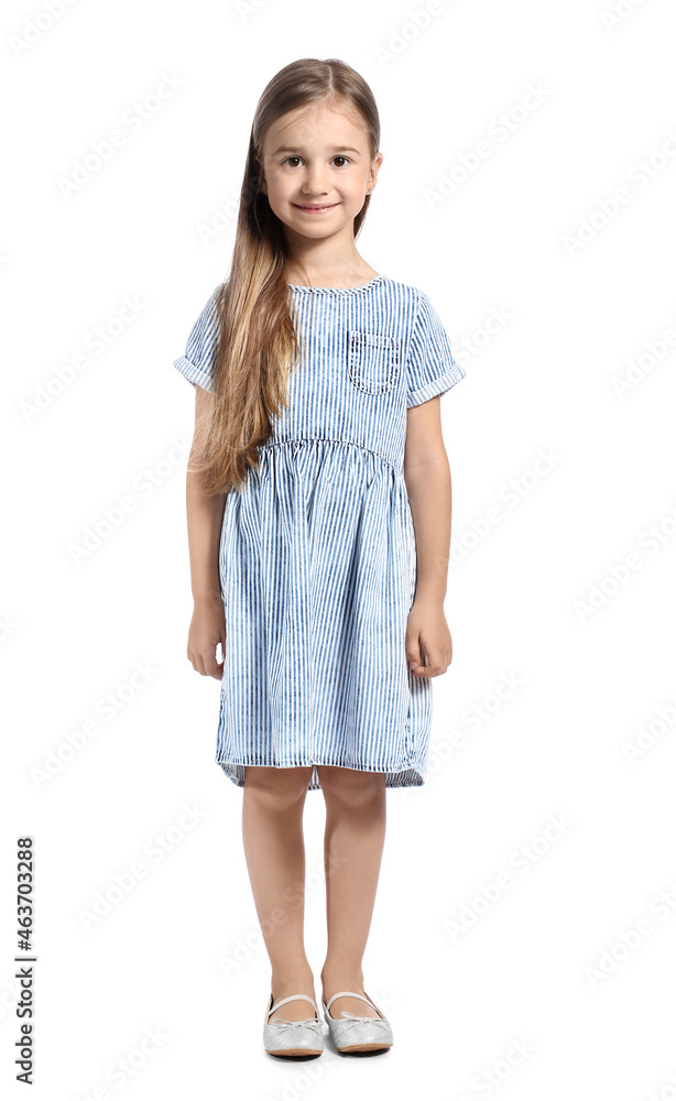 Obraz premium Cute little girl in striped dress on white background