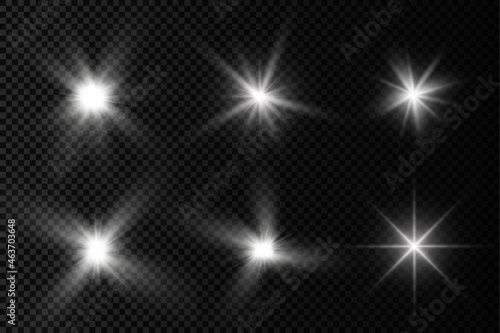 White glowing light star  burst sun rays.