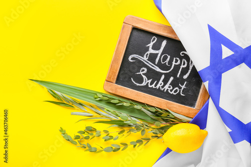 Composition for Sukkot celebration on color background photo
