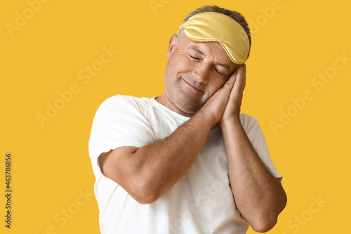 Mature man with sleep mask ...