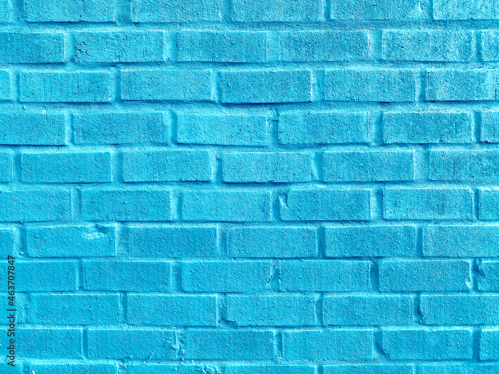 Obraz premium freshly painted stone brick wall garden building structure aqua blue paint
