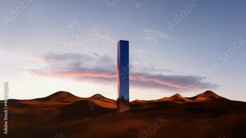 Desert dune landscape at sunset with a metal column  photo