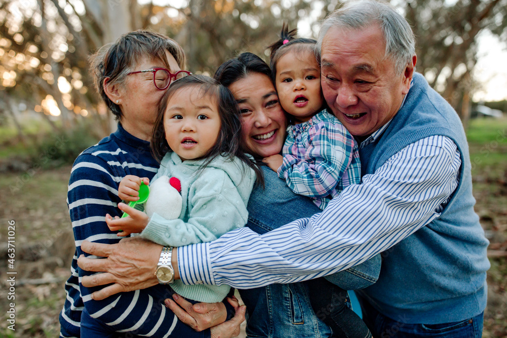 © Erin Brant/Stocksy - Joyful extended family hug © Erin Brant/Stocksy - Joyful extended family hug